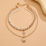 Layered Pearl & Gold Charm Necklace