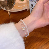 Elegant Pearl & Camellia Flower Bracelet