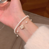 Elegant Pearl & Camellia Flower Bracelet