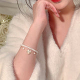 Elegant Pearl & Camellia Flower Bracelet