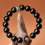 Obsidian & Lotus Emblem Flow Bracelet