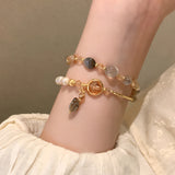 Elegant Pearl Charm Bracelet