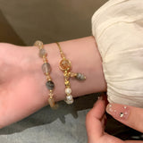 Elegant Pearl Charm Bracelet